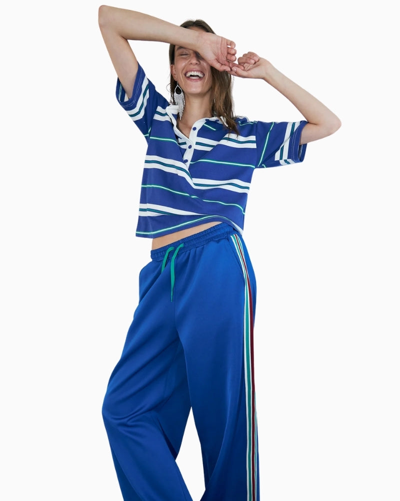 Woman wearing Lollys Laundry Liam blue striped pants – Áines Boutique