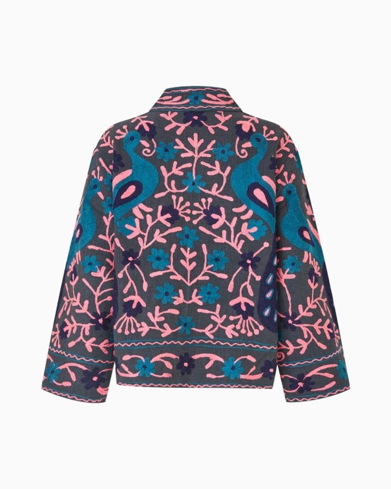 Back of embroidered cotton jacket showing floral detail and relaxed fit