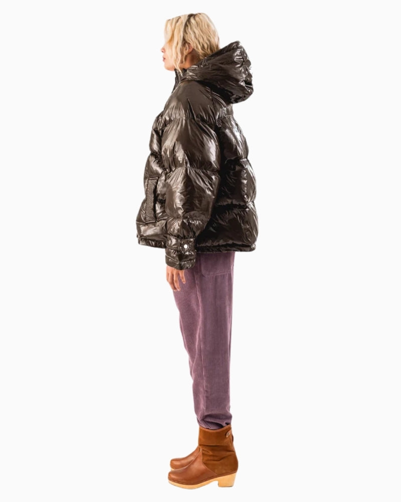 Side view of ShelbyLL coat showing high collar, hood, and drawstring hem
