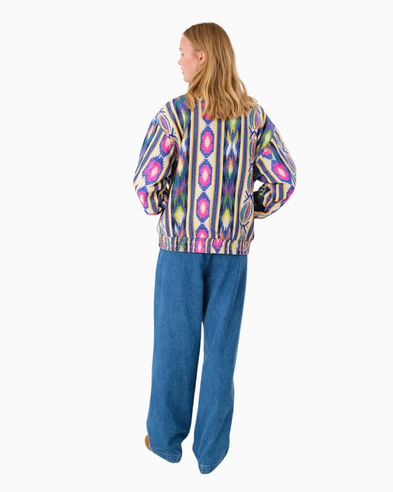 Back view of colourful bomber-style jacket with relaxed fit