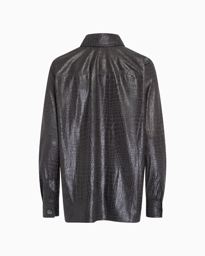 Back of grey blouse showing fluid drape and simple silhouette