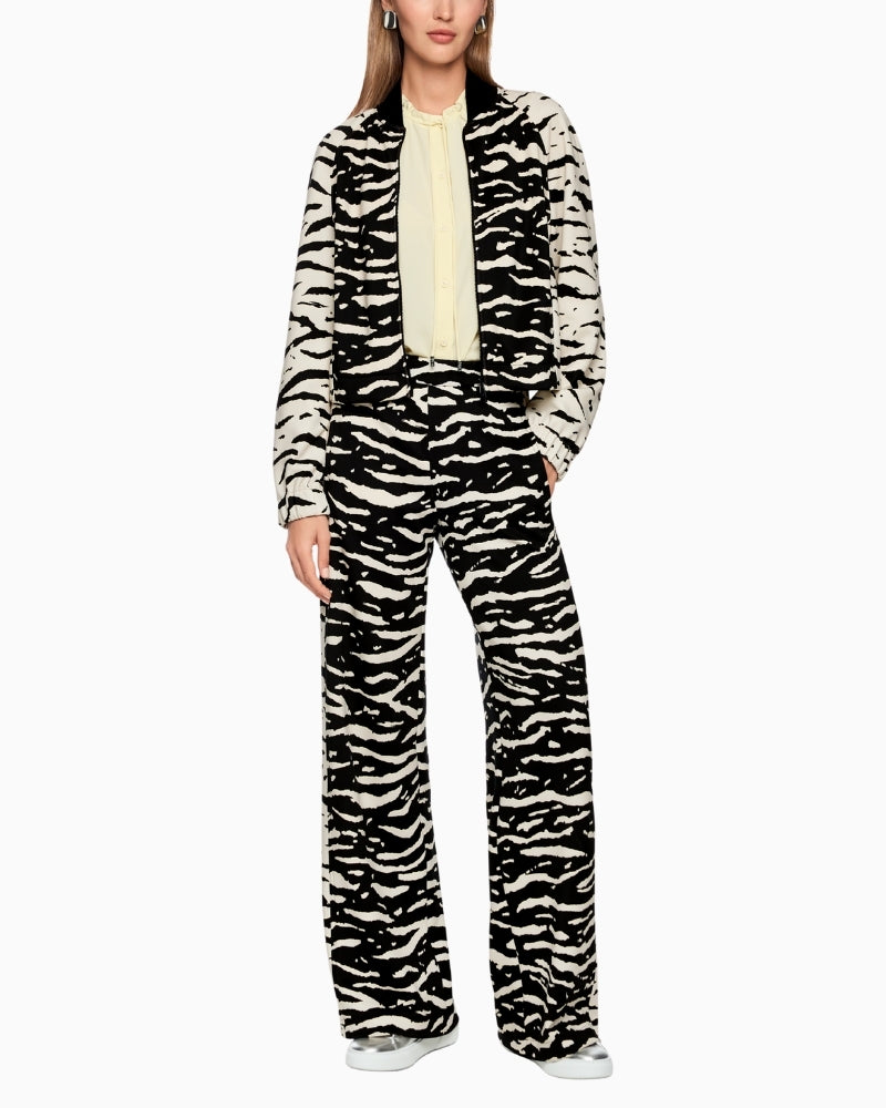 Marc Cain printed bomber jacket styled with jeans and trainers