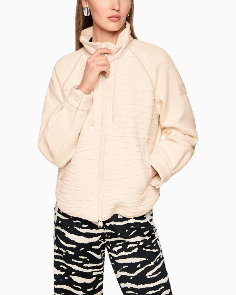 Cream animal print jacket with zip front and ribbed sleeves