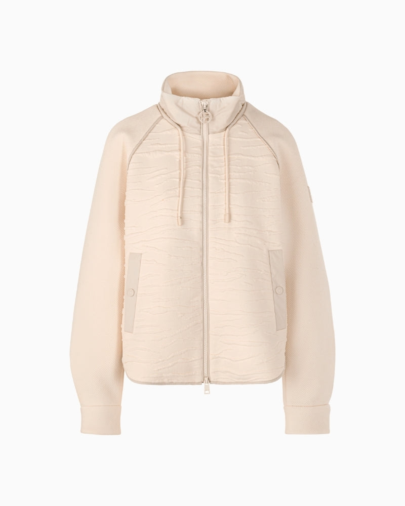 Front view of zip-up jacket showing relaxed fit and side pockets