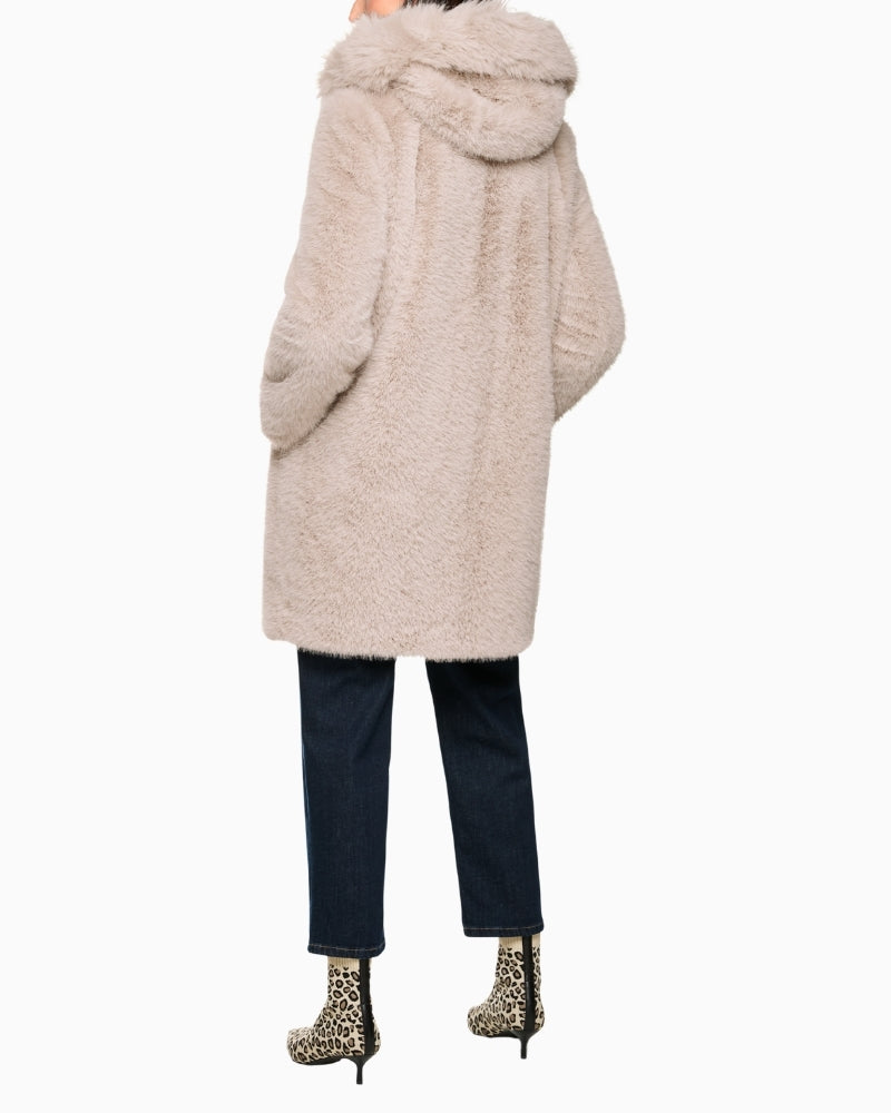 Back view showing loose fit and practical pockets