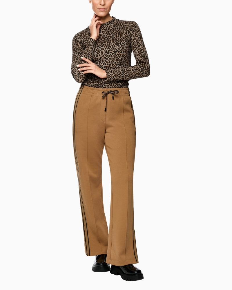 Marc Cain leopard shirt layered under knit vest for a stylish autumn outfit