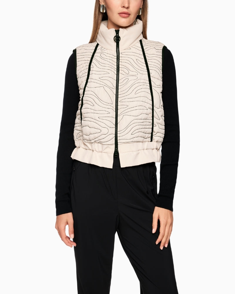 Marc Cain cream quilted vest with wave stitching and flounce detail