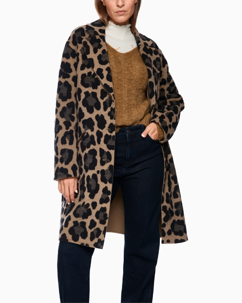 Front view of Marc Cain reversible coat with leopard print and button fastening