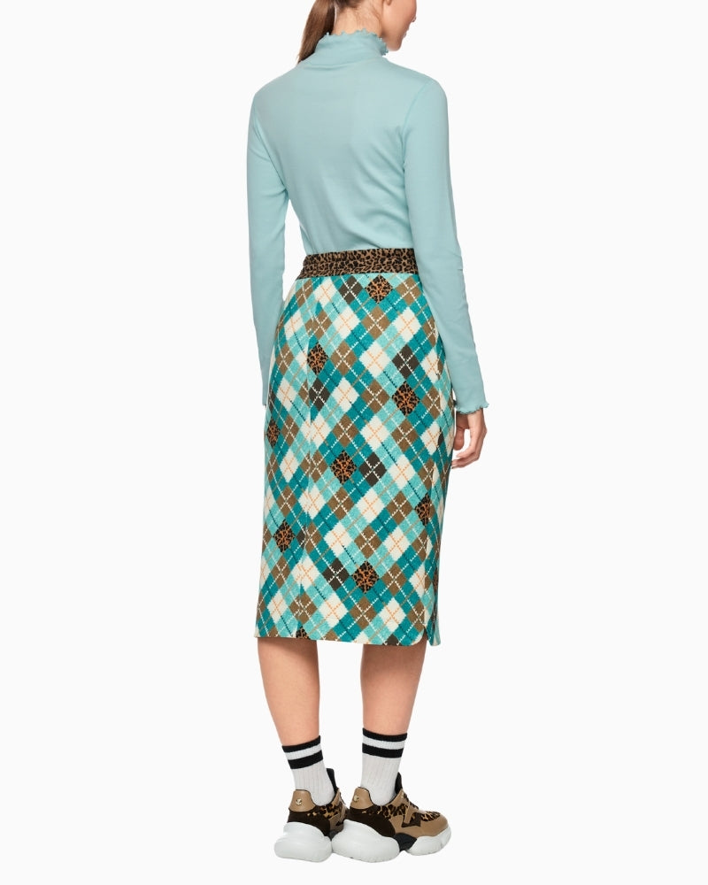 Back view of fitted long-sleeved top showing stretch comfort