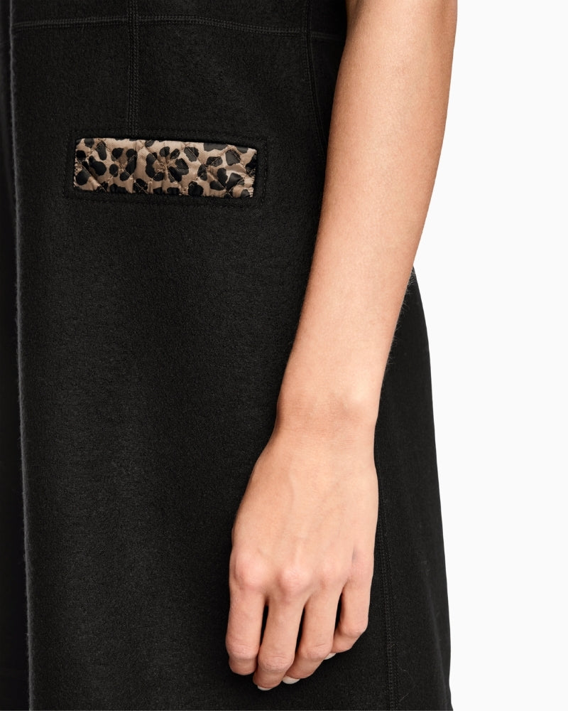 Close-up of virgin wool texture and tailored faux pocket detail