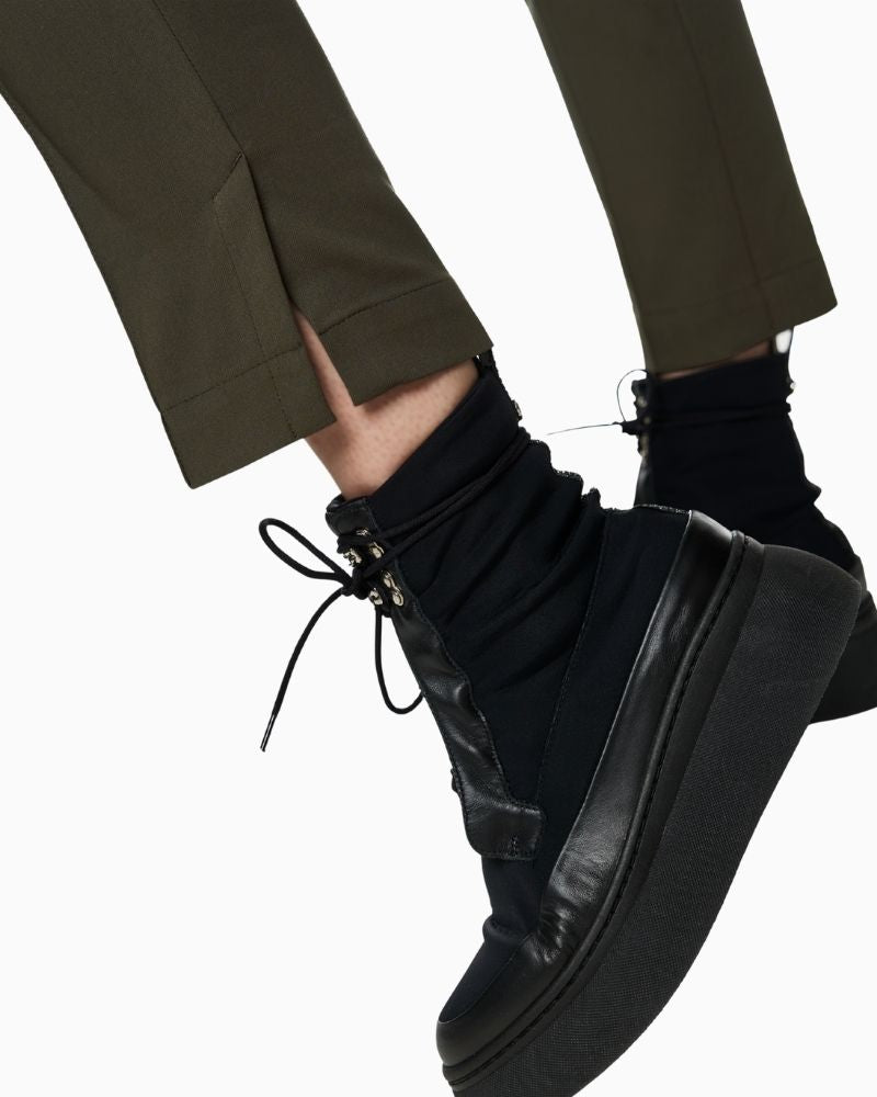 Close up of Marc Cain SYDNEY trousers in olive with stitched crease and cropped leg