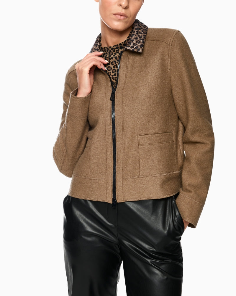 Front view of Marc Cain walk jacket in boiled wool with leopard print collar and zip