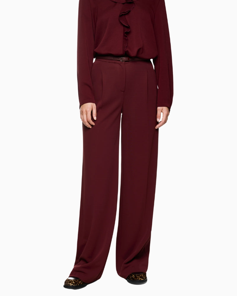 Front view of Marc Cain WICHITA wide-leg trousers with high waist and creases