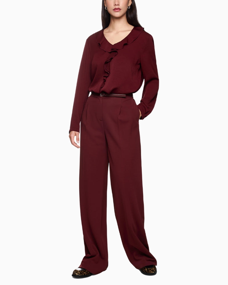 Front view of Marc Cain WICHITA wide-leg trousers with high waist and creases