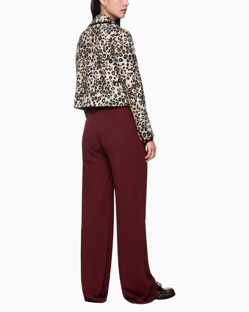 Back view of tailored viscose trousers in clean black finish