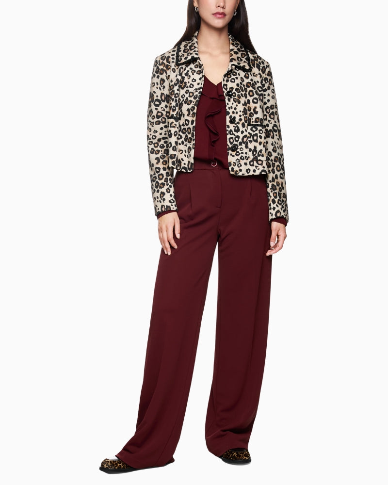 Front view of Marc Cain WICHITA wide-leg trousers with high waist and creases