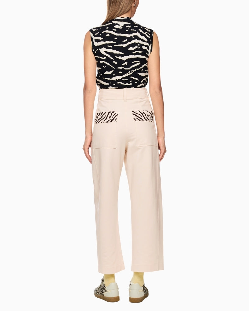 Back view of cream culottes showing animal print pocket detail