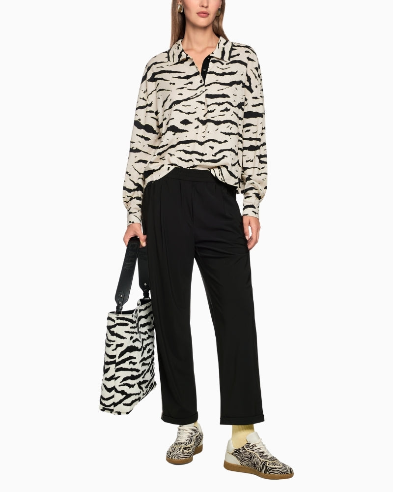 Marc Cain WUXI trousers styled casually with trainers and tee