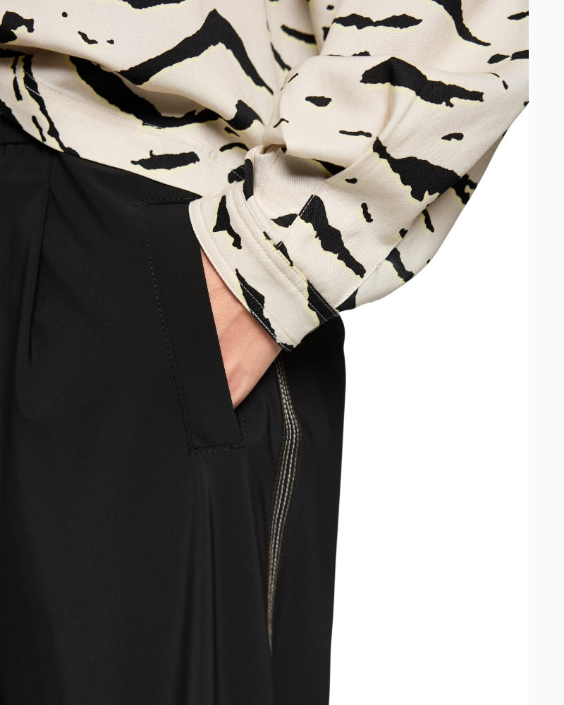 Close-up of elasticated waistband and breathable stretch fabric