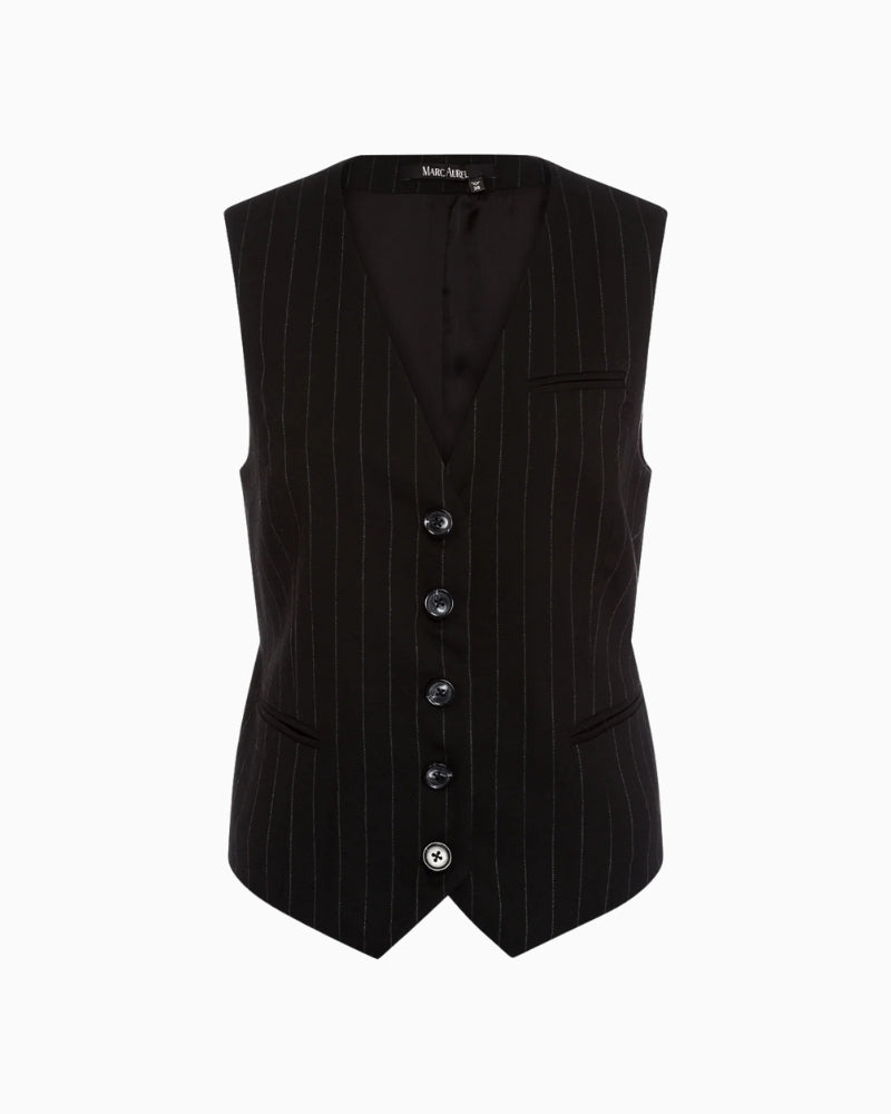 Close-up of the pinstripe fabric and piped pocket detail on the women’s flannel waistcoat