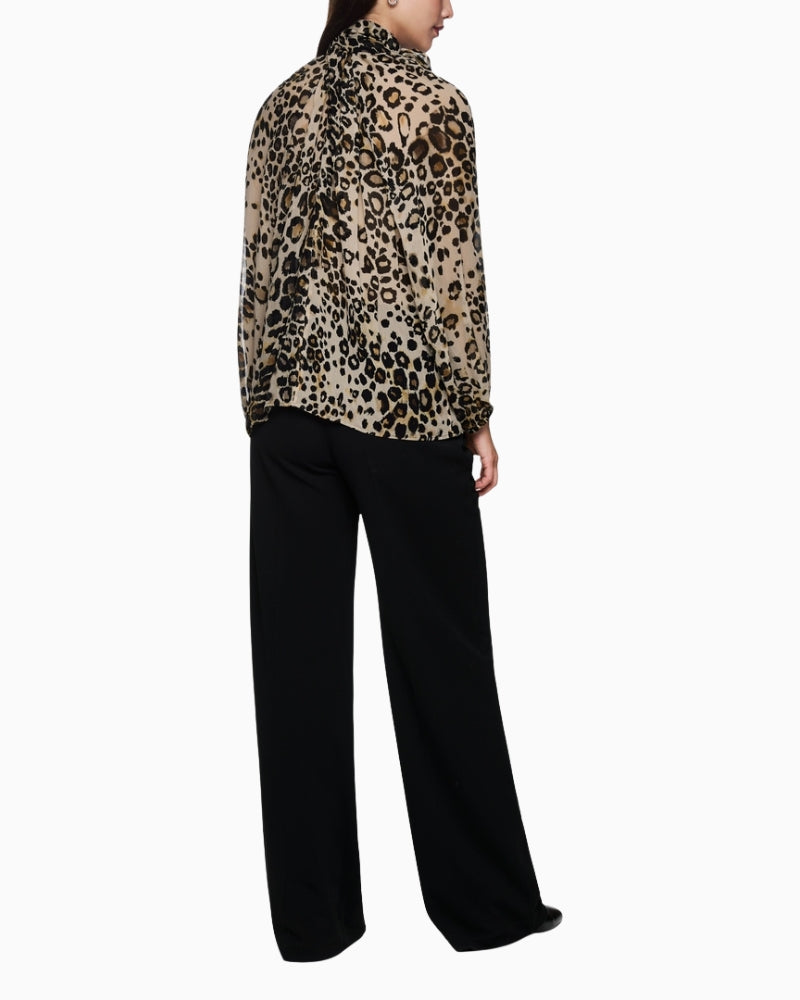 Back view of relaxed-fit Marc Cain leopard print blouse
