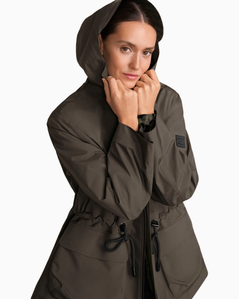 Detail of waist drawstring and flap pockets