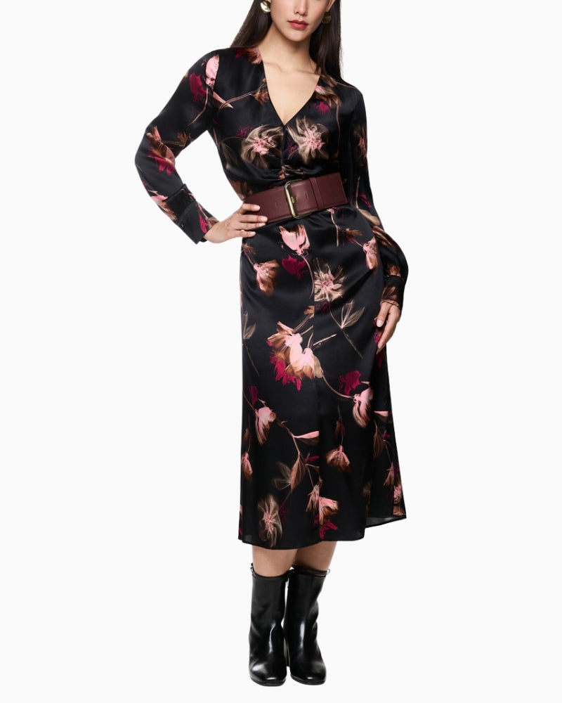 Side angle showing flowing fabric and V-neckline