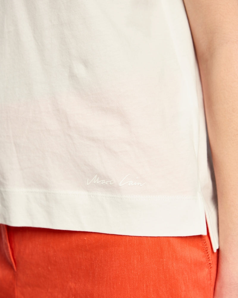 Marc Cain hibiscus print T-shirt off-white hem detail with side slits