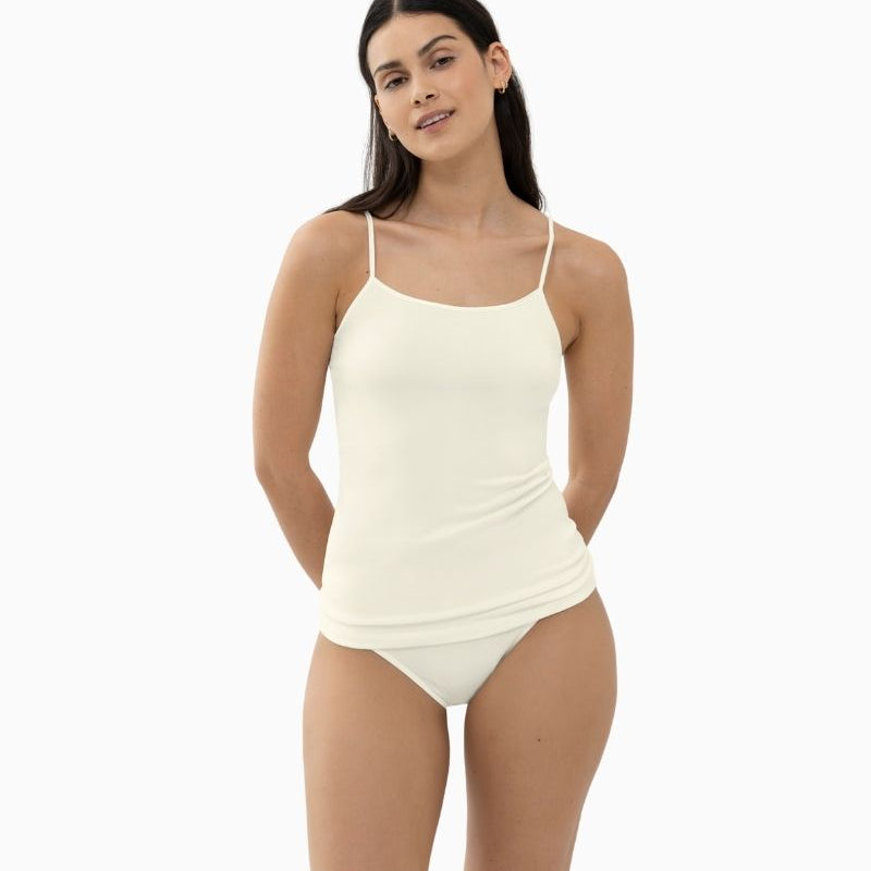 White slim fit spaghetti strap top by Mey with seamless sides