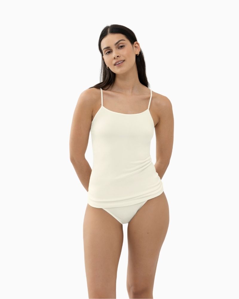 White slim fit spaghetti strap top by Mey with seamless sides