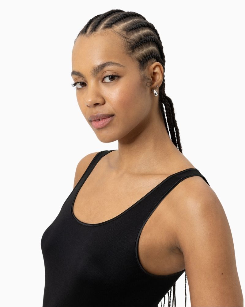 Close up of Black wide strap tank top by Mey with seamless sides and slim fit