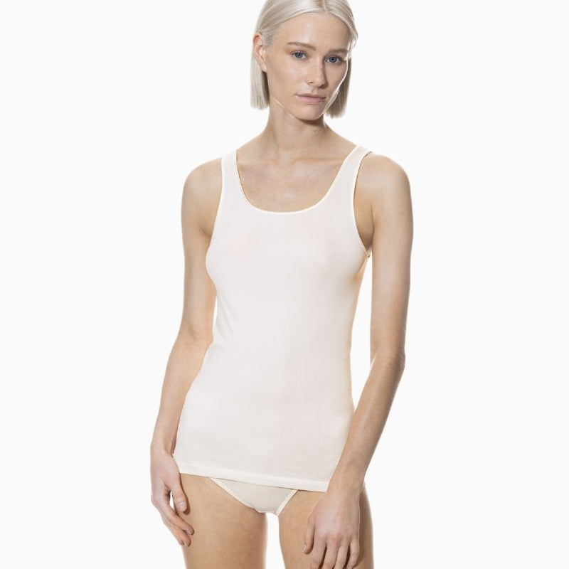 Champagne-coloured tank top by Mey with wide straps and seamless finish