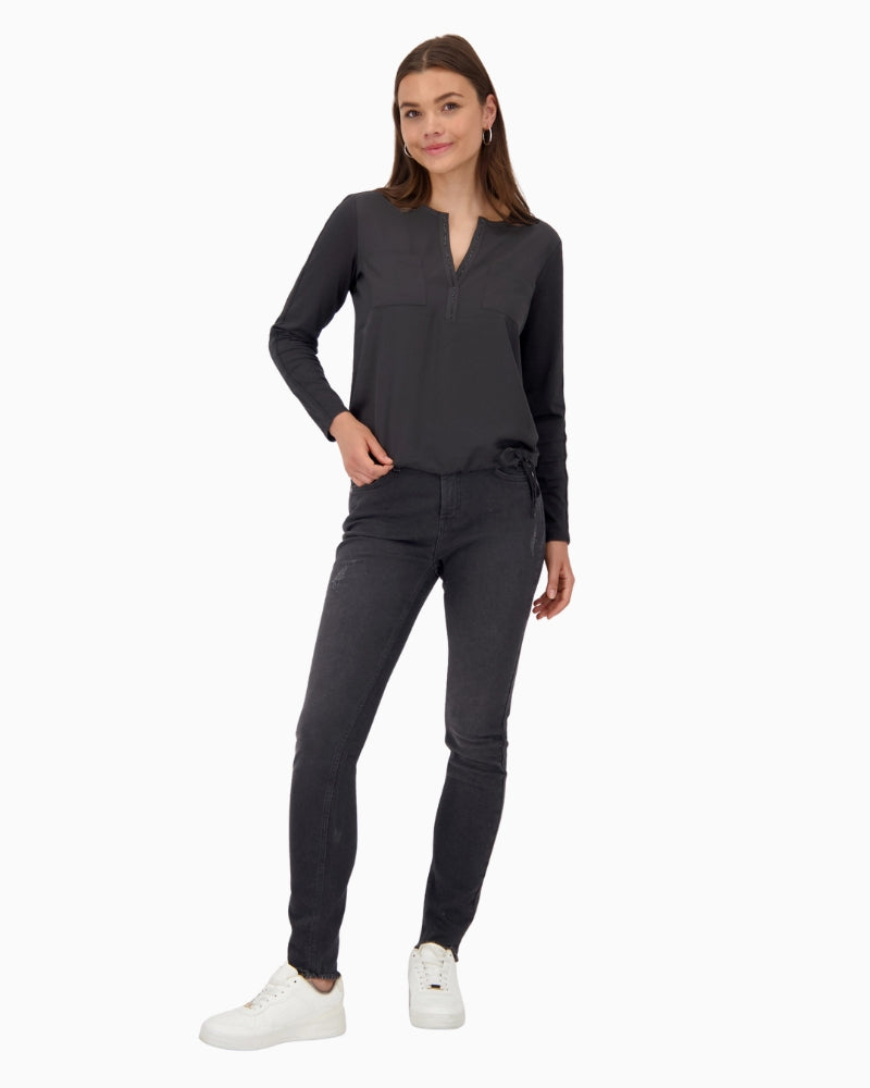 Monari blouse styled with tailored trousers for an elegant everyday look