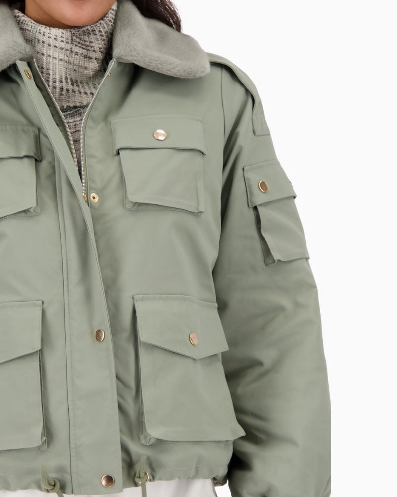 Close-up of fluffy faux fur collar and shirt-style neckline