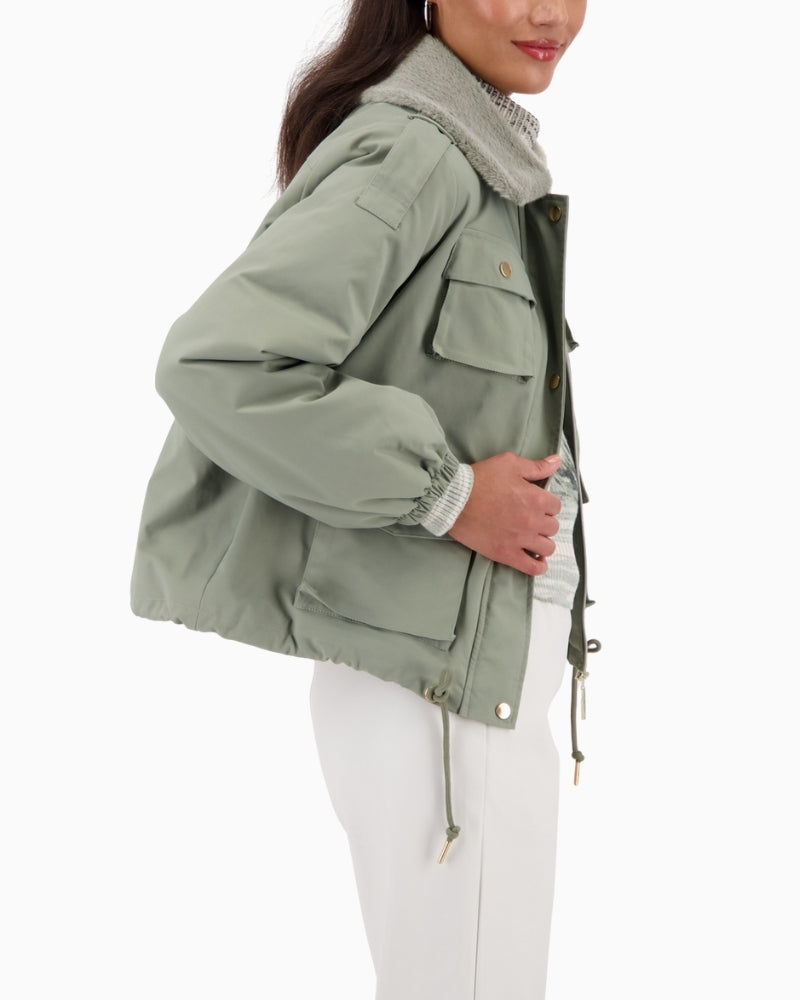 Side view of Monari cargo jacket showing shoulder tabs and pocket detail