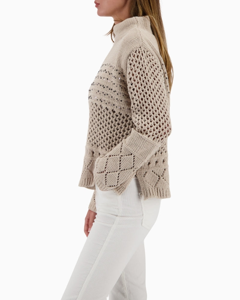 Side view of textured chenille jumper with stand-up collar
