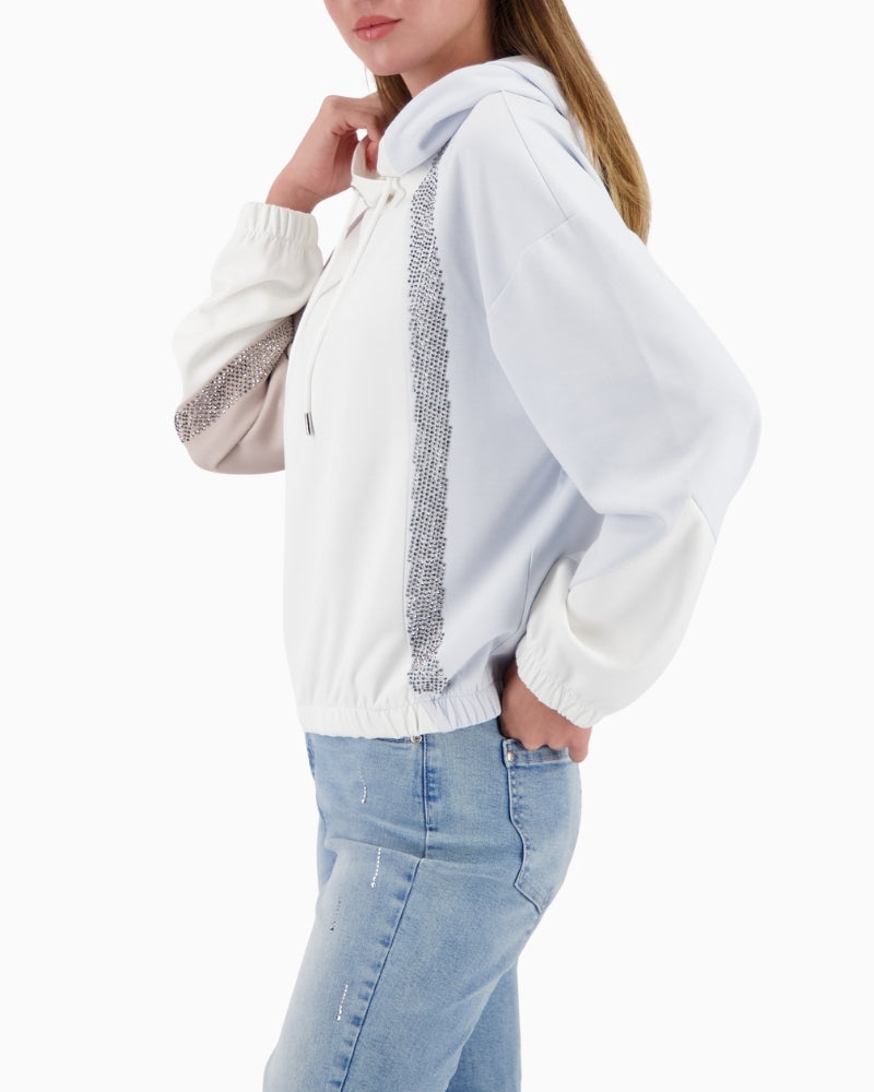 Side view of Monari hoodie showing relaxed fit and soft fabric