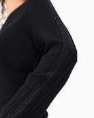 Close-up of sleeve showing rhinestone accents on elegant Monari jumper
