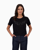 Black cotton T-shirt by Monari with eagle print and pearl detail