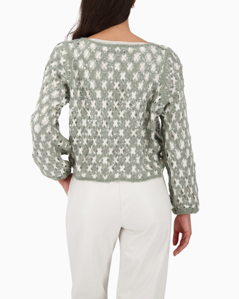 Back view of Monari cornely knit showing soft fabric and shape