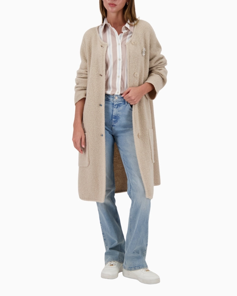 Long sleeve knit coat by Monari in neutral beige wool blend