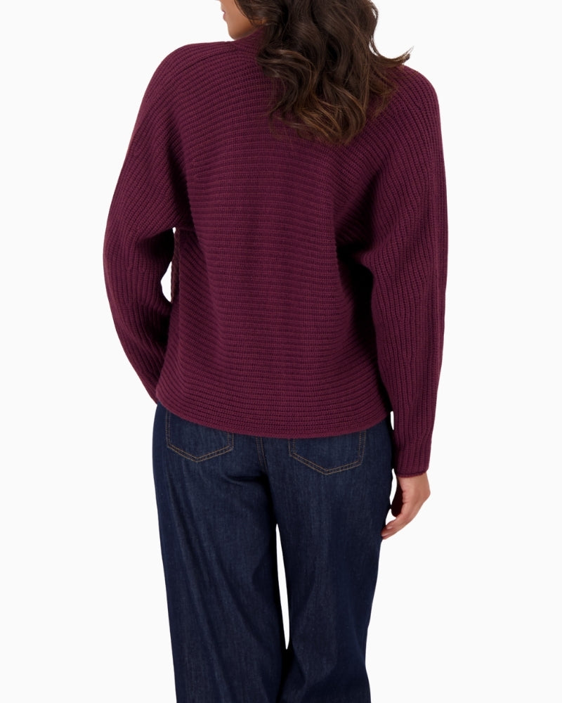 Back view of relaxed-fit knit throw with dropped shoulders