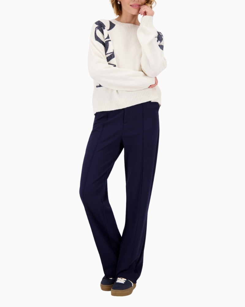 Model wearing Monari knit jumper styled with jeans for casual wear