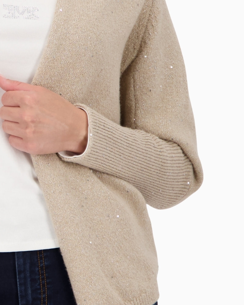 Close-up of sequin and lurex detail on Monari knitted throw