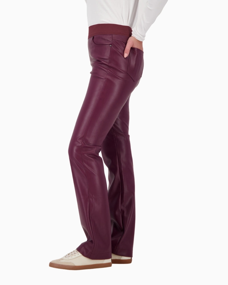 Side view of sleek leather-look fabric and side pocket detail