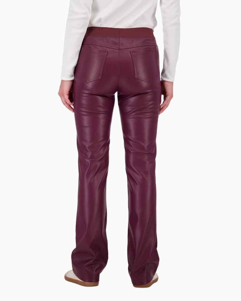 Back view of faux leather trousers with patch pockets