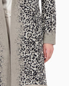 Close-up of cotton blend knit texture and leopard pattern on Monari coat