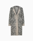 Front view of Monari leopard print knitted coat with lapel collar and button fastening