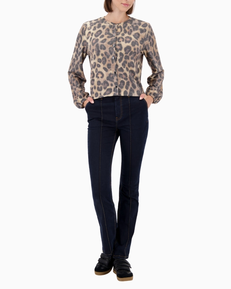 Model wearing Monari jacket styled casually with trousers