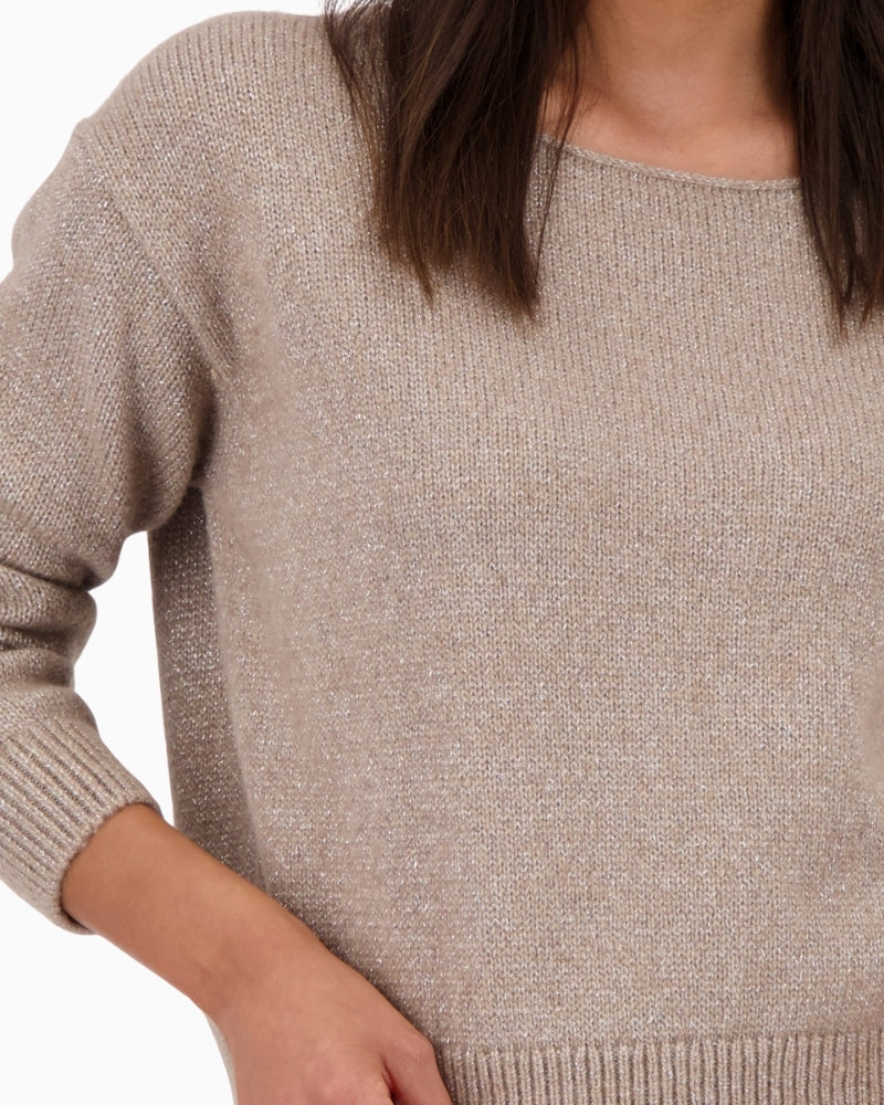 Close-up of lurex knit texture with subtle shimmer
